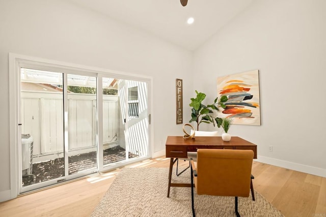 office featuring ceiling fan, wood finished floors, high vaulted ceiling, baseboards, and recessed lighting