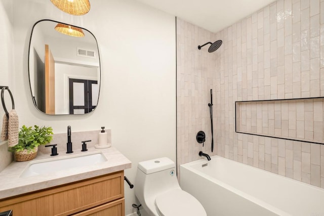 full bathroom featuring vanity, bathtub / shower combination, toilet, and visible vents