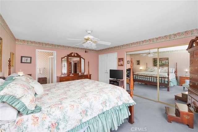 20902 Balgair Cir, Huntington Beach, CA 92646 - bedroom featuring multiple closets, carpet, a ceiling fan, and visible vents