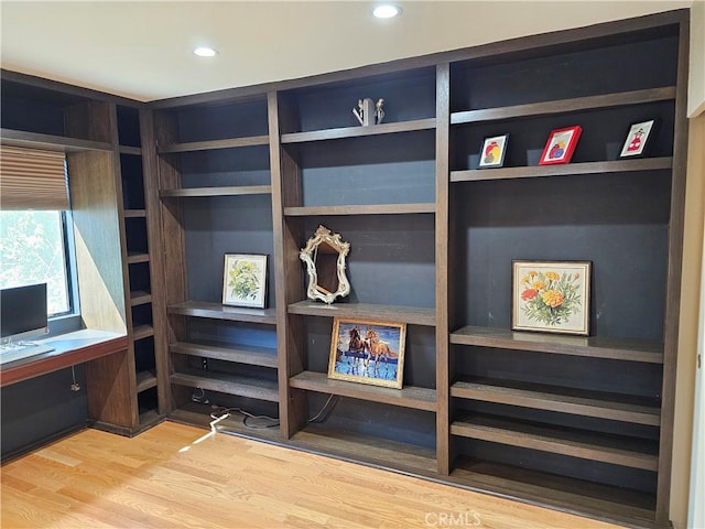 interior details featuring recessed lighting and wood finished floors