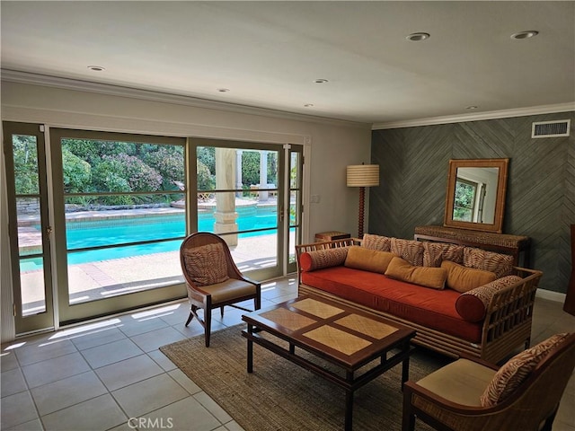 tiled living room with crown molding and visible vents