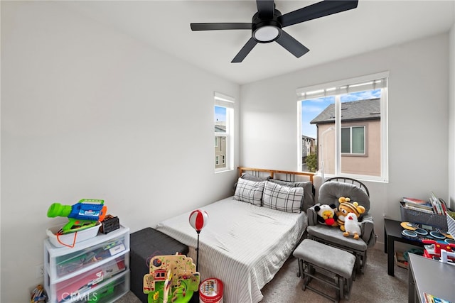 bedroom with carpet flooring and a ceiling fan