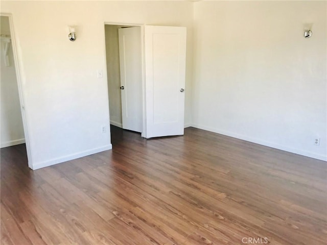 2853 Buckingham Rd, Los Angeles, CA 90016 - empty room with baseboards and wood finished floors