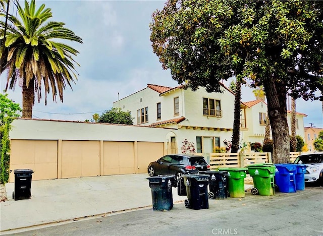 2853 Buckingham Rd, Los Angeles, CA 90016 - view of property exterior featuring a tile roof and stucco siding