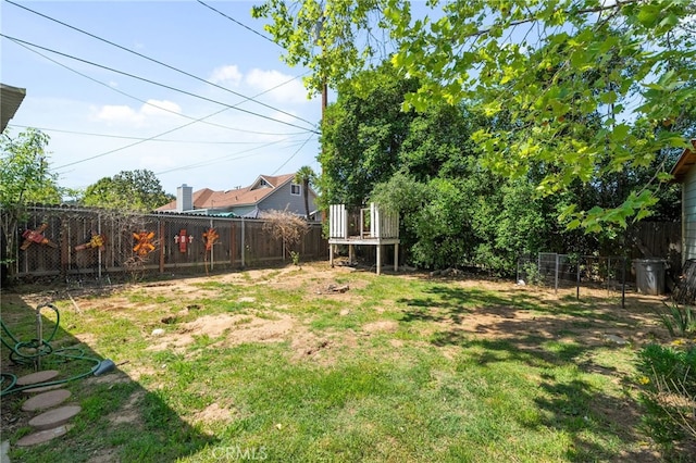 view of yard with a fenced backyard