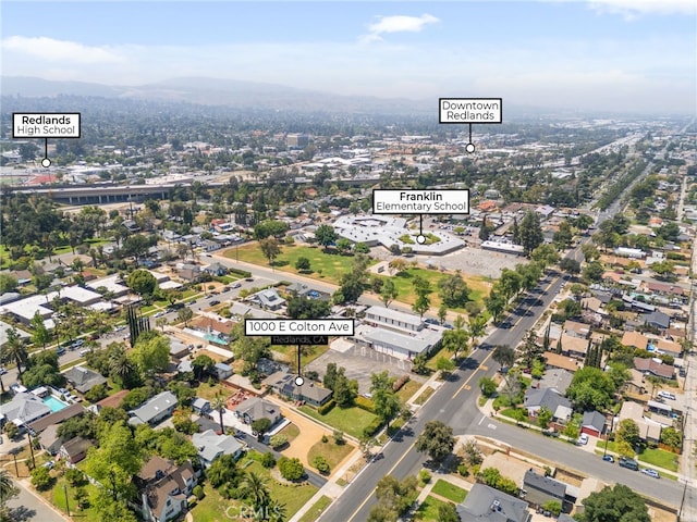 aerial view featuring a residential view and a mountain view