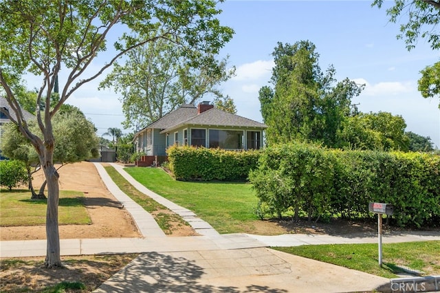 exterior space featuring a lawn