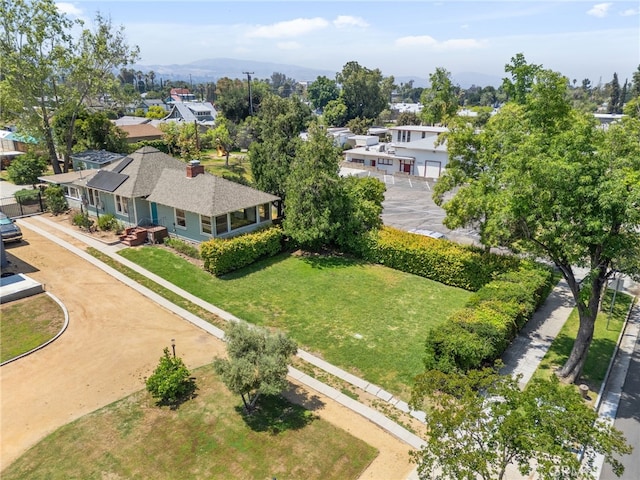 drone / aerial view with a residential view and a mountain view