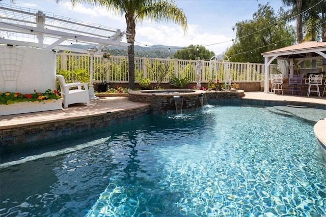 2830 Mount Niguel Cir, Corona, CA 92882 - view of swimming pool featuring an in ground hot tub, fence, a fenced in pool, and a gazebo