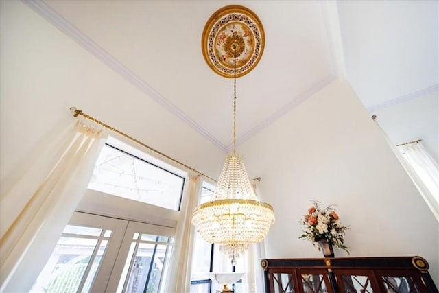 2830 Mount Niguel Cir, Corona, CA 92882 - room details with crown molding, a notable chandelier, and french doors
