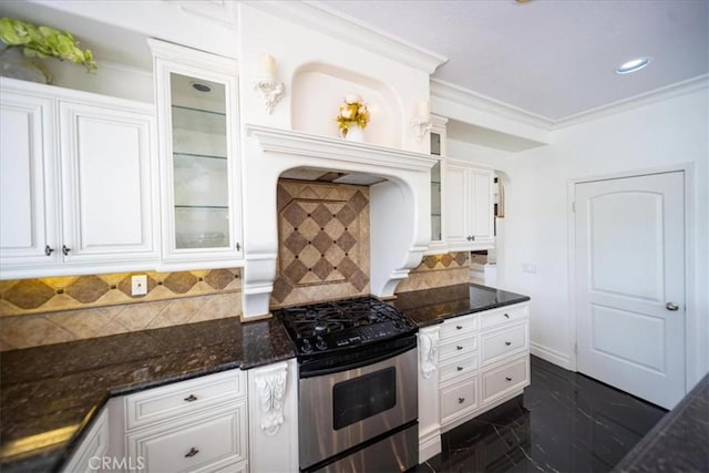 2830 Mount Niguel Cir, Corona, CA 92882 - kitchen with tasteful backsplash, stainless steel gas stove, dark stone countertops, glass insert cabinets, and white cabinetry