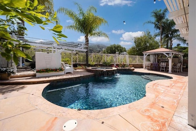 2830 Mount Niguel Cir, Corona, CA 92882 - view of pool featuring a gazebo, a pool with connected hot tub, a fenced backyard, and a patio area