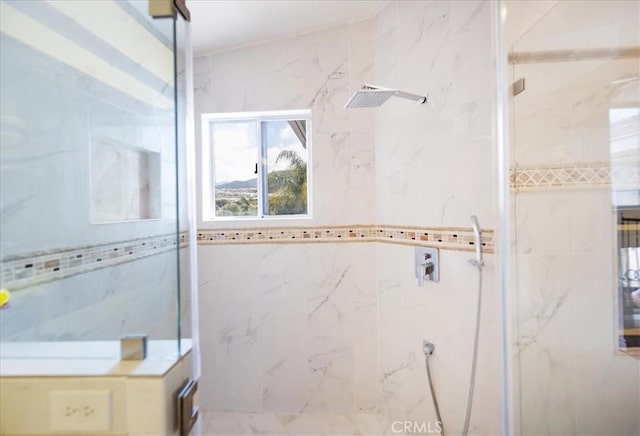 2830 Mount Niguel Cir, Corona, CA 92882 - full bathroom featuring a marble finish shower and tile walls