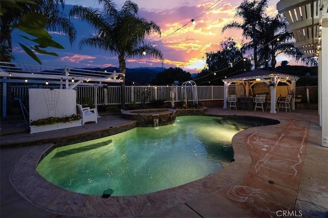 2830 Mount Niguel Cir, Corona, CA 92882 - view of swimming pool featuring a gazebo, a pool with connected hot tub, a fenced backyard, and a patio area