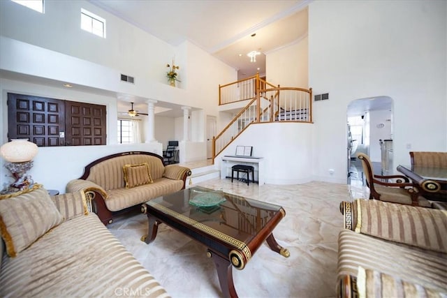 2830 Mount Niguel Cir, Corona, CA 92882 - living room featuring a high ceiling, stairs, and visible vents