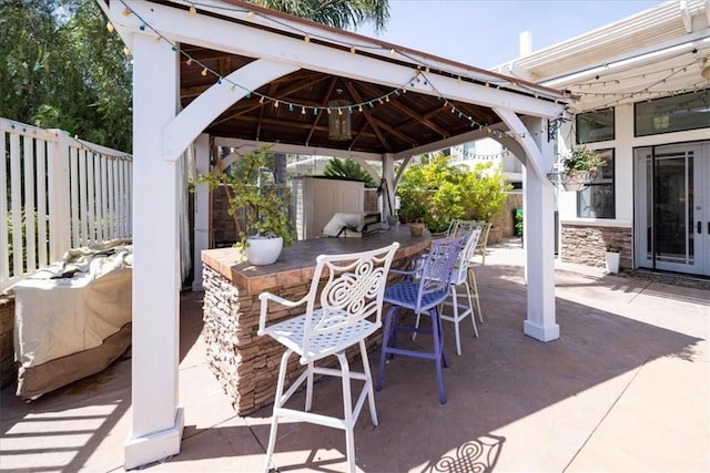 2830 Mount Niguel Cir, Corona, CA 92882 - view of patio / terrace featuring fence, outdoor dry bar, and a gazebo