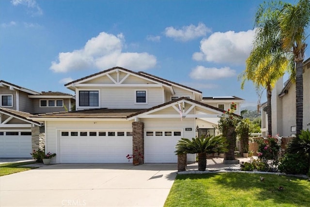 2830 Mount Niguel Cir, Corona, CA 92882 - craftsman inspired home featuring concrete driveway, an attached garage, and a front yard