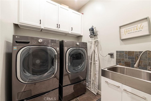 27014 Monterey Ave, Valencia, CA 91355 - laundry area with cabinet space and washing machine and dryer