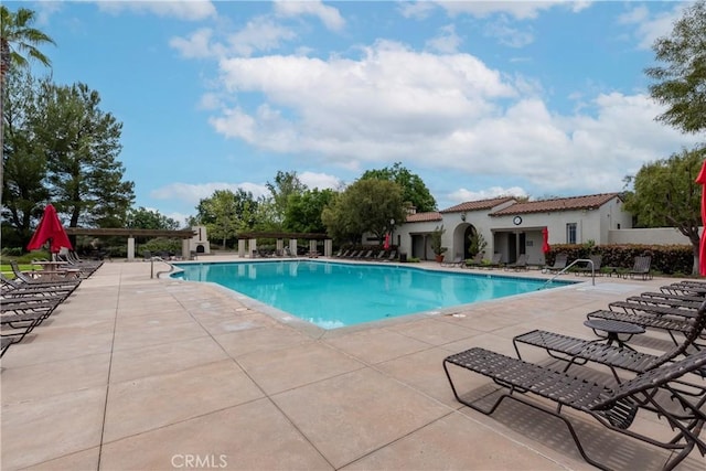 27014 Monterey Ave, Valencia, CA 91355 - community pool with a patio and a pergola