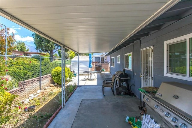 view of patio featuring a fenced backyard and grilling area