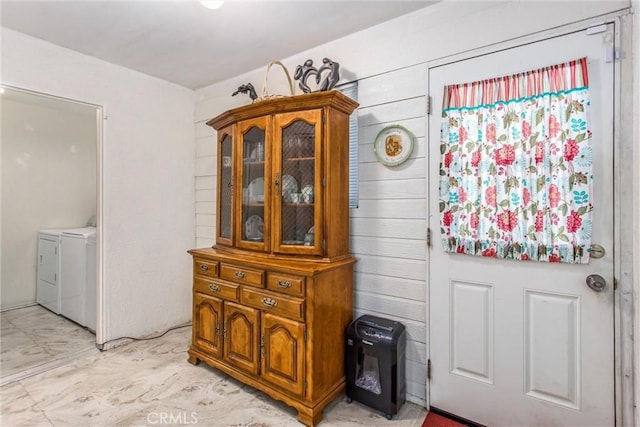 interior space featuring washing machine and clothes dryer