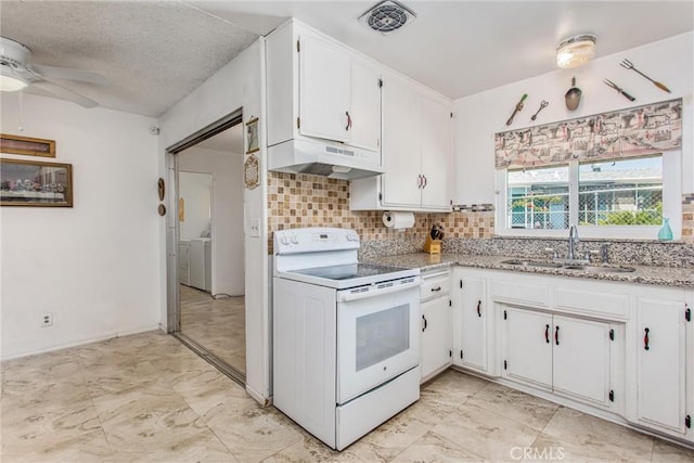 kitchen featuring a sink, marble finish floor, white cabinetry, under cabinet range hood, and white electric stove