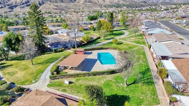 bird's eye view with a residential view and a mountain view