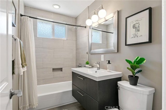 bathroom with vanity, tile patterned flooring, toilet, and shower / bath combination with curtain