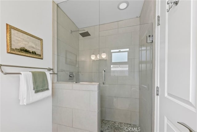 bathroom featuring a stall shower