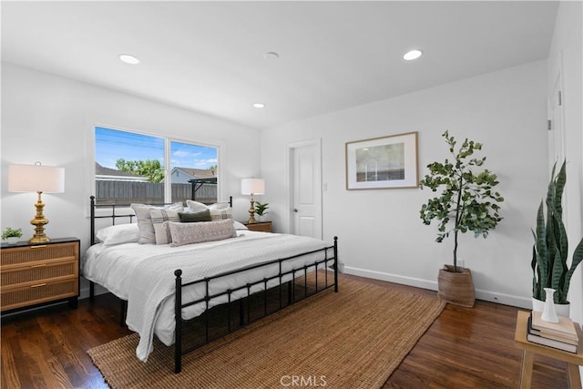bedroom featuring recessed lighting, baseboards, and wood finished floors