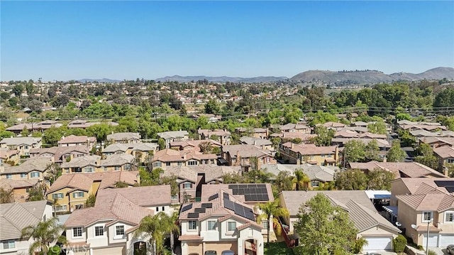 bird's eye view with a residential view and a mountain view