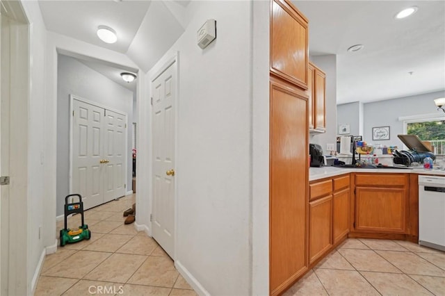 interior space with light tile patterned floors, baseboards, and recessed lighting