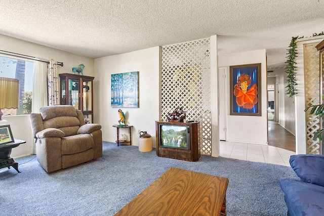 tiled living room with carpet flooring and a textured ceiling