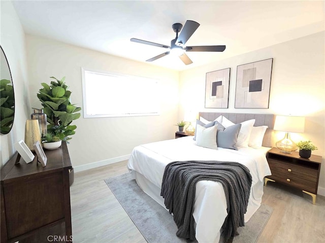 8611 Chapman Ave, Garden Grove, CA 92841 - bedroom featuring light wood-style floors, baseboards, and ceiling fan