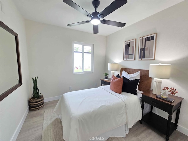 8611 Chapman Ave, Garden Grove, CA 92841 - bedroom featuring light wood-style flooring, baseboards, and ceiling fan