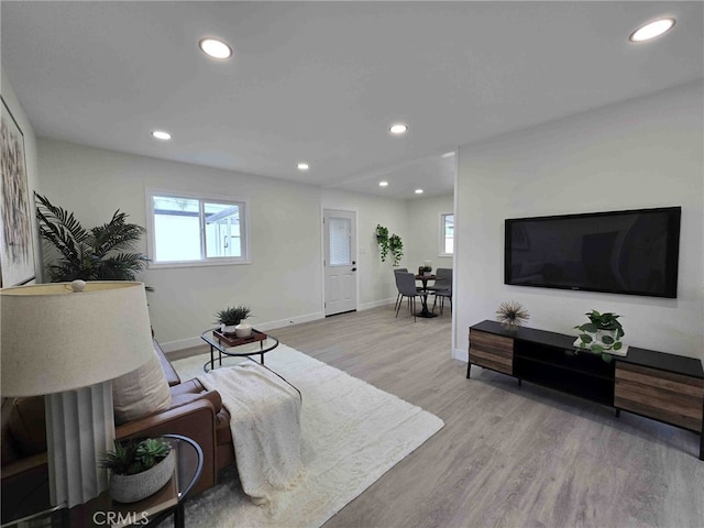 8611 Chapman Ave, Garden Grove, CA 92841 - living area with recessed lighting, baseboards, and wood finished floors