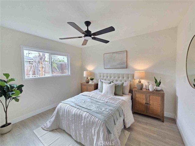 8611 Chapman Ave, Garden Grove, CA 92841 - bedroom featuring baseboards, wood finished floors, and ceiling fan