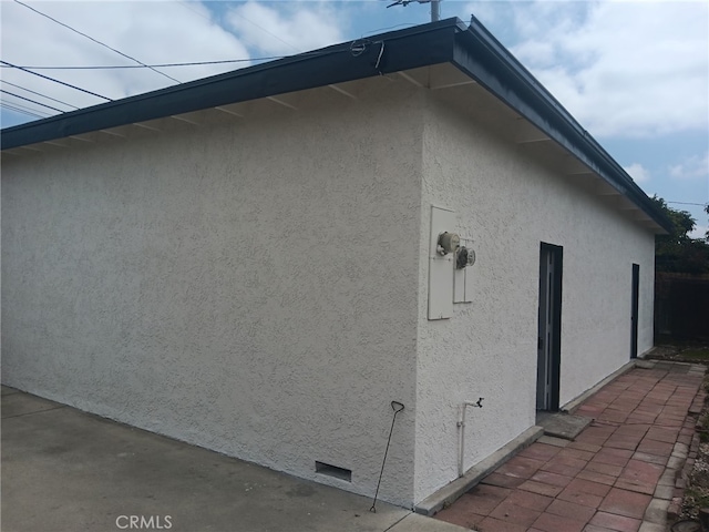 8611 Chapman Ave, Garden Grove, CA 92841 - view of side of home featuring stucco siding
