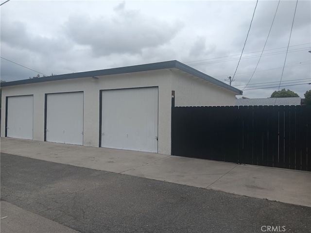 8611 Chapman Ave, Garden Grove, CA 92841 - garage featuring fence