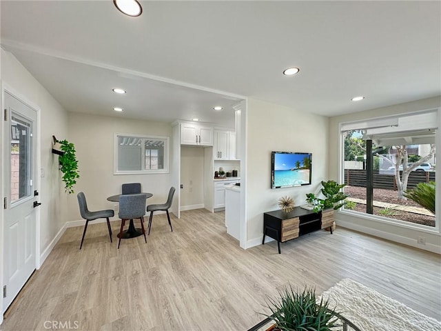 8611 Chapman Ave, Garden Grove, CA 92841 - living room featuring light wood finished floors, baseboards, and recessed lighting