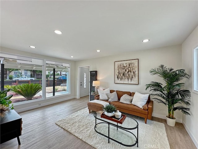 8611 Chapman Ave, Garden Grove, CA 92841 - living room featuring wood finished floors, recessed lighting, and baseboards