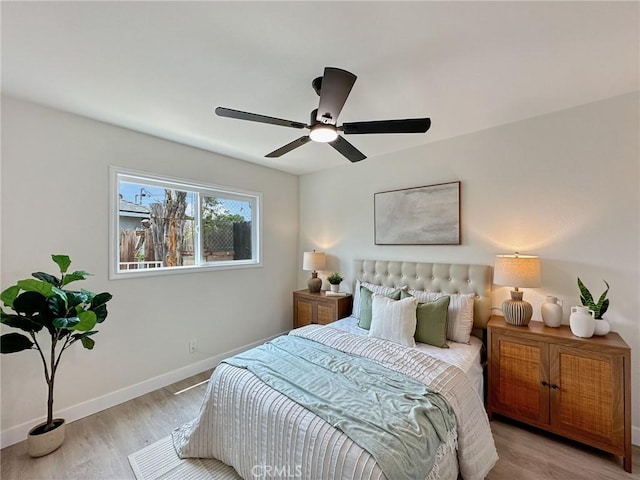 8611 Chapman Ave, Garden Grove, CA 92841 - bedroom featuring baseboards, light wood-type flooring, and a ceiling fan