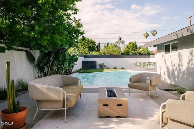view of swimming pool with a fenced in pool, an outdoor fire pit, a patio area, and fence private yard