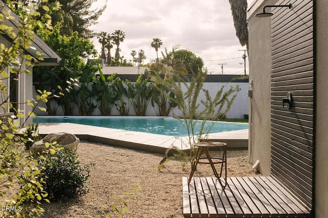 view of pool featuring a fenced in pool and a fenced backyard