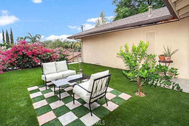 view of yard with an outdoor hangout area, fence, and a patio