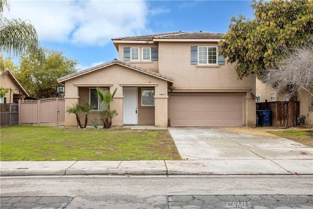 347 Beckes St, Wasco, CA 93280 - traditional home with a garage, a gate, stucco siding, and fence