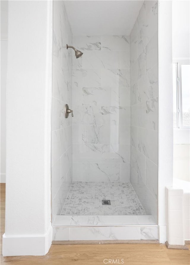347 Beckes St, Wasco, CA 93280 - bathroom with wood finished floors and a stall shower