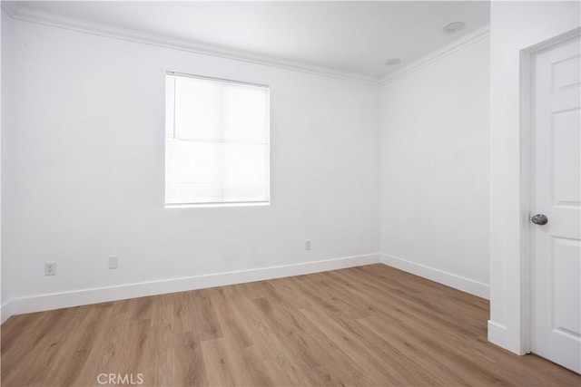 347 Beckes St, Wasco, CA 93280 - unfurnished room with baseboards, ornamental molding, and light wood-type flooring