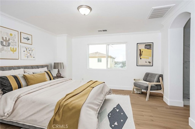 347 Beckes St, Wasco, CA 93280 - bedroom featuring visible vents, baseboards, crown molding, and wood finished floors