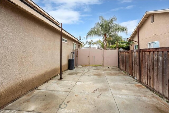 347 Beckes St, Wasco, CA 93280 - view of patio with fence and a gate
